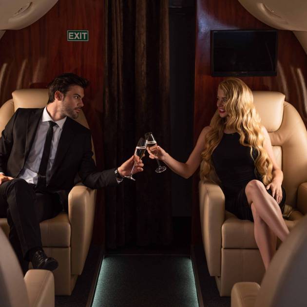 elegant-stylish-couple-clinking-with-champagne-gla-2024-11-17-15-30-25-utc-min
